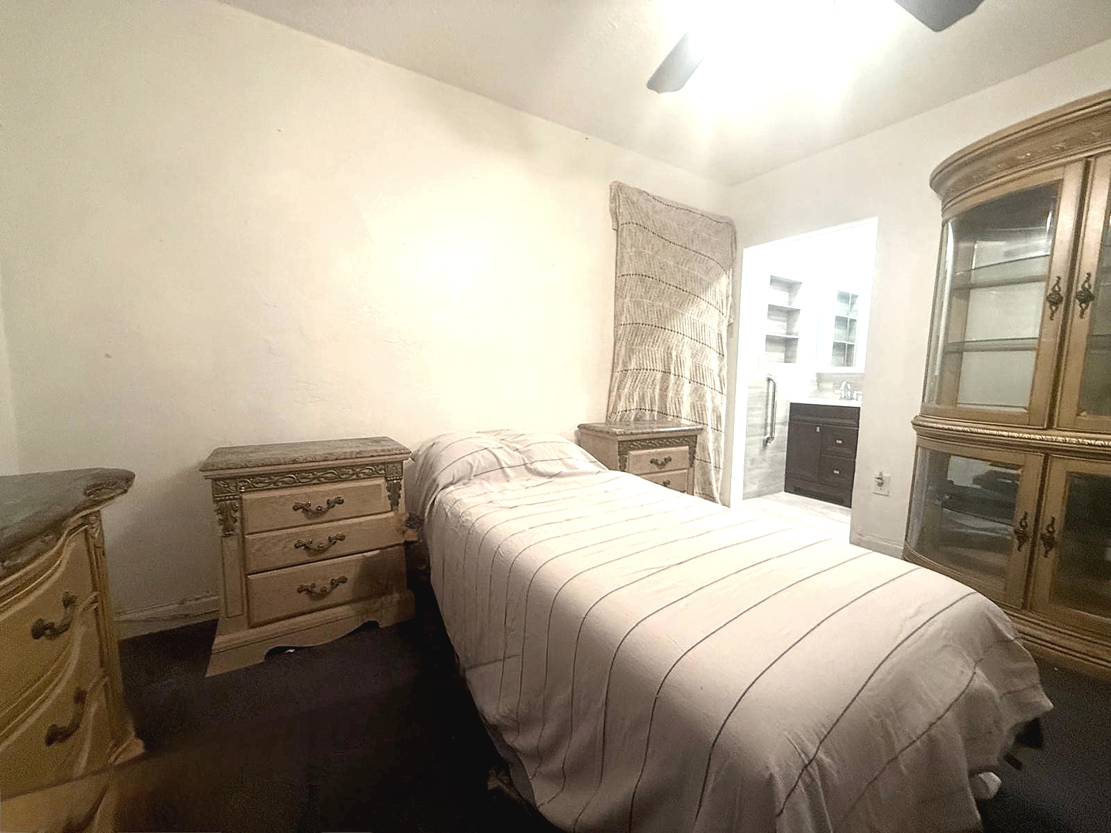 Primary bedroom sized for king bed